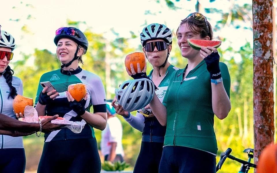 Riders sharing refreshments with local hosts