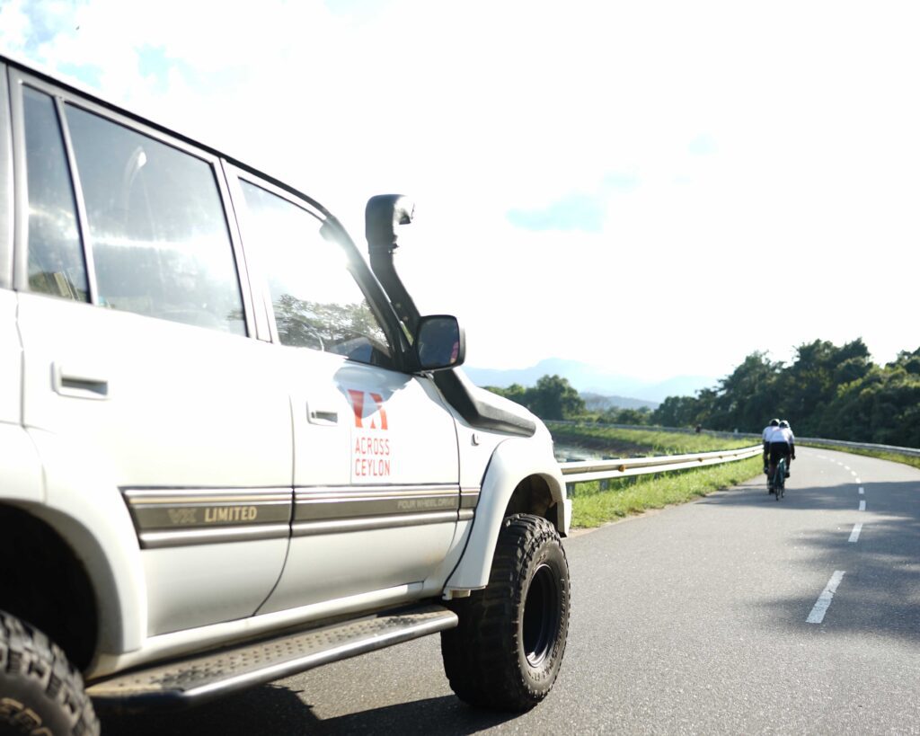 Across Ceylon Cycling team vehicle convoy